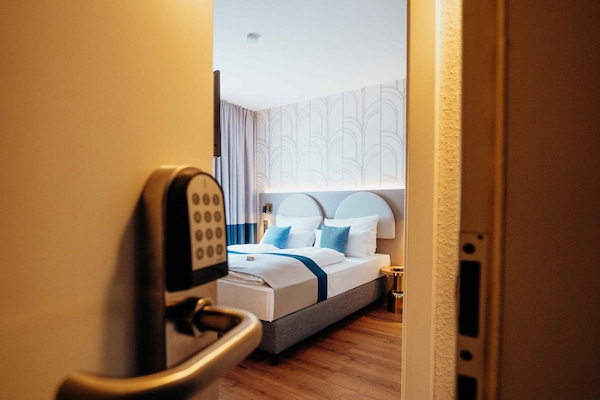 Habitación doble Deluxe | Caja de seguridad en la habitación y insonorización