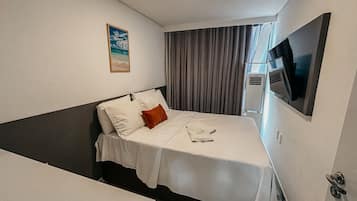 Apartamento Deluxe | Ropa de cama de alta calidad y colchones con acolchado adicional