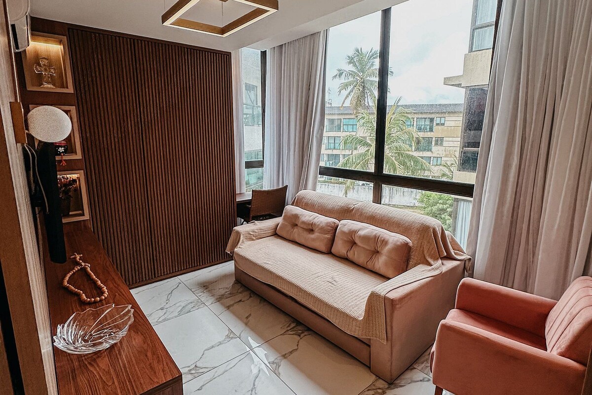 Deluxe Apartment | Living area | 50-inch Smart TV with digital channels