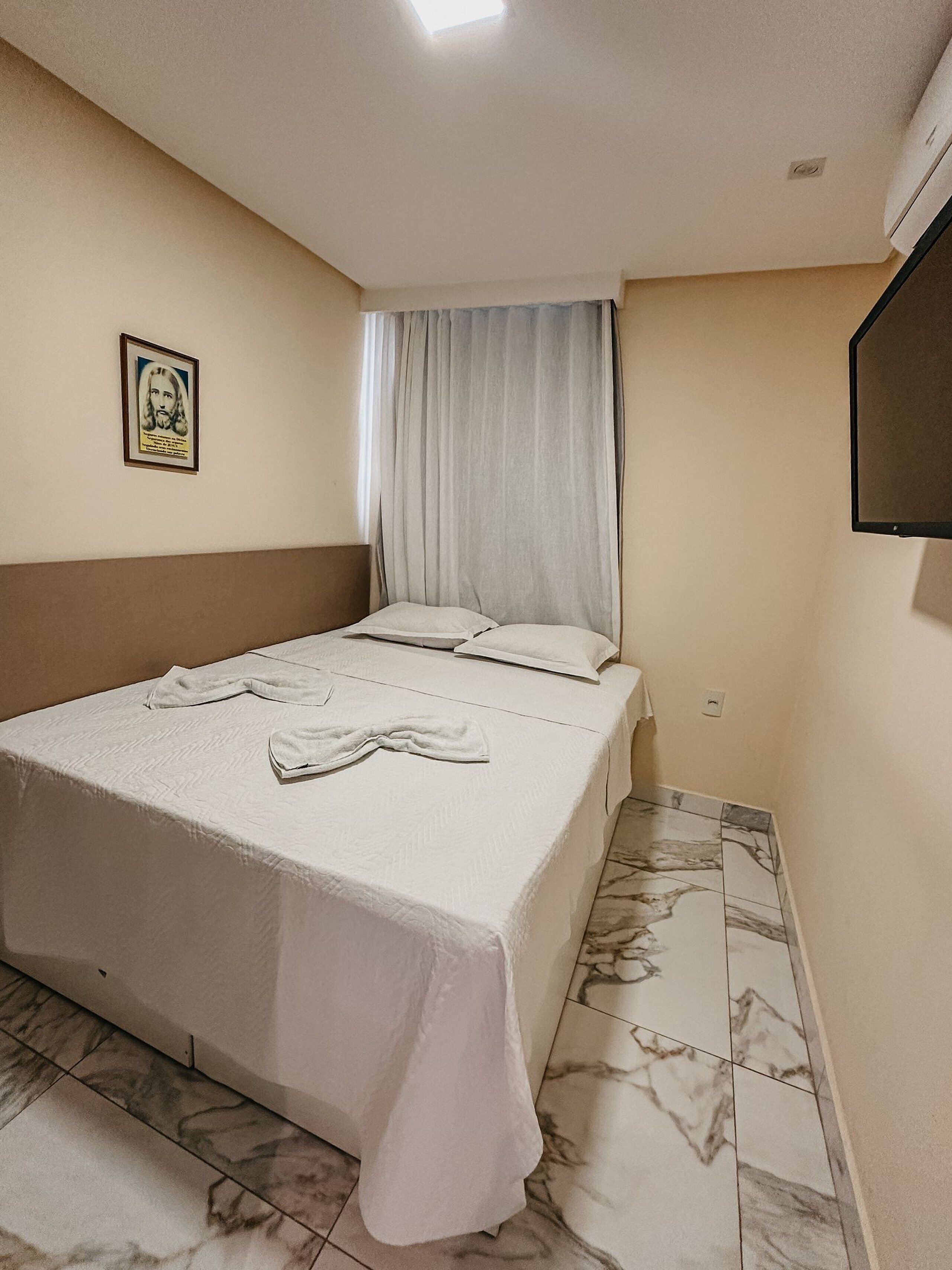 Apartamento Deluxe | Ropa de cama de alta calidad y colchones con acolchado adicional