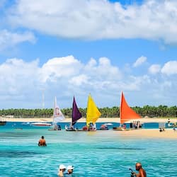 On the beach, white sand, free beach cabanas, sun-loungers