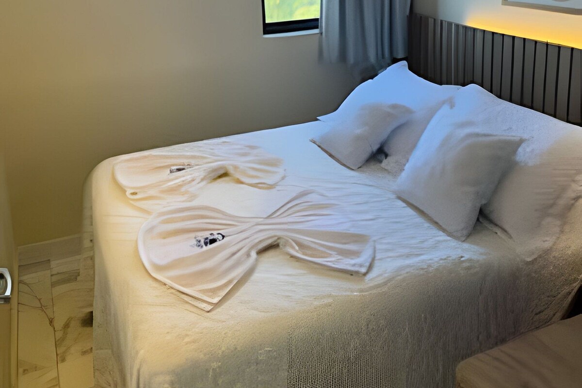 Apartamento Deluxe | Ropa de cama de alta calidad y colchones con acolchado adicional