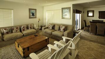 Traditional House | Living area | 42-inch flat-screen TV with satellite channels