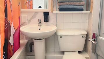 Hair dryer, towels, soap, toilet paper