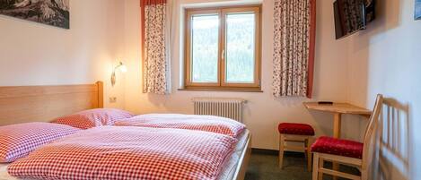 1 bedroom, travel crib, WiFi, bed sheets