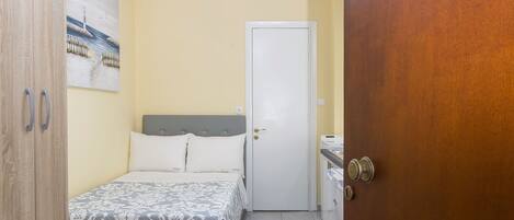 Departamento urbano | 1 habitación, tabla de planchar con plancha, wifi gratis y ropa de cama