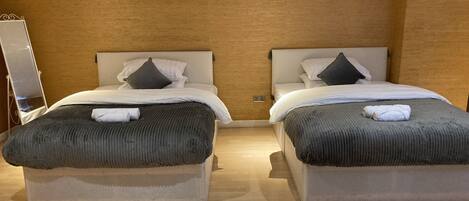 شقة | 2 عدّة غرف نوم وملاءات أسرّة