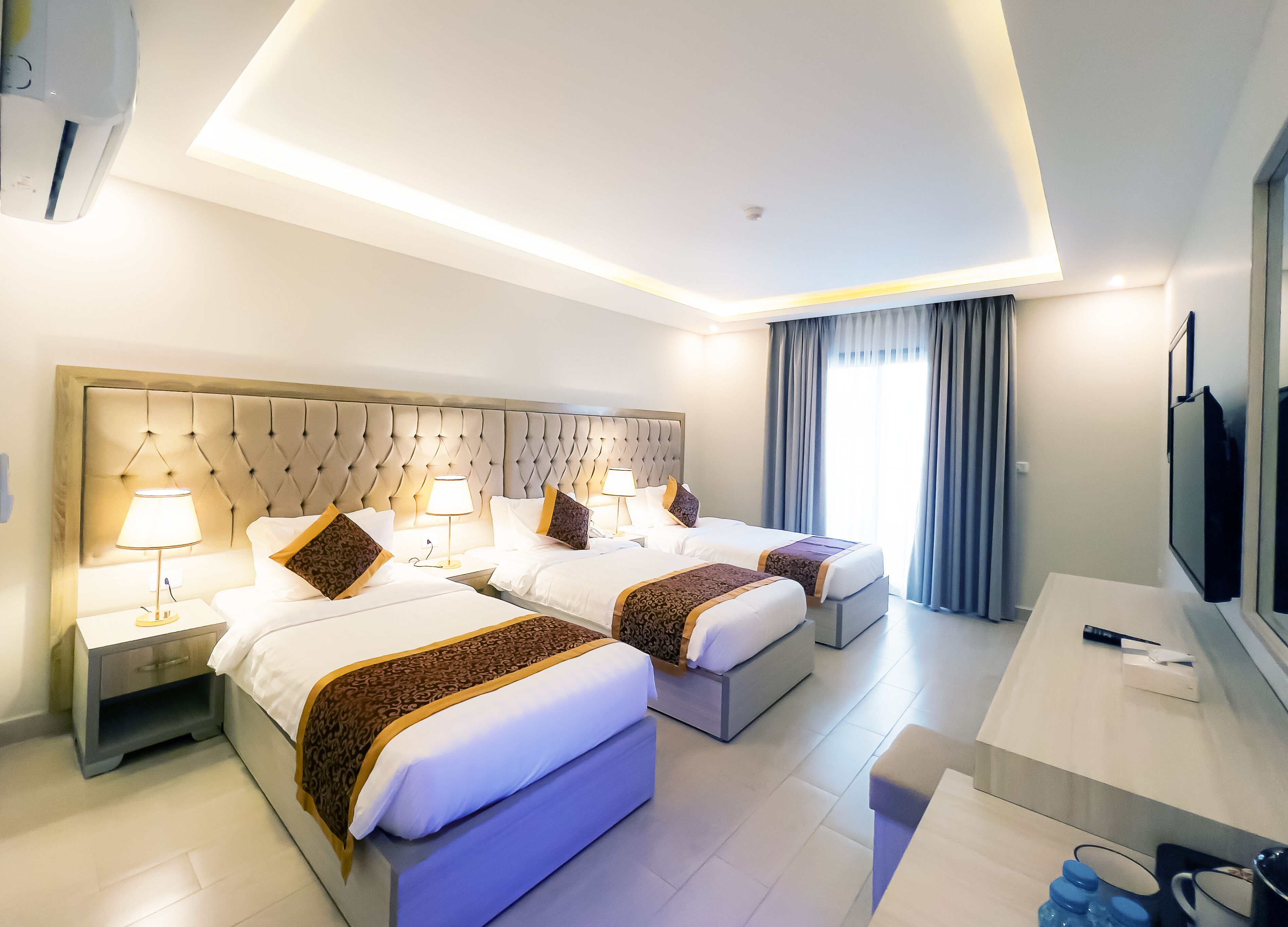 Chambre Triple Deluxe | Literie de qualité supérieure, mini-bar avec articles gratuits