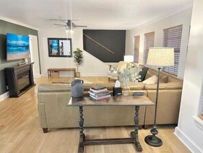 Smart TV, fireplace, DVD player, books