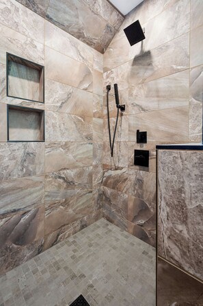 Shower, hair dryer, towels, toilet paper