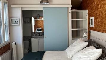 1 chambre, fer et planche Ă repasser, Wi-Fi gratuit, draps fournis