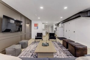 Smart TV, books - Modern Contemporary 2BR Basement Suite
(Edmonton)