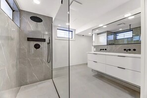 Shower, hair dryer, towels, soap