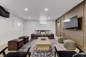 Smart TV, books - Modern Contemporary 2BR Basement Suite
(Edmonton)