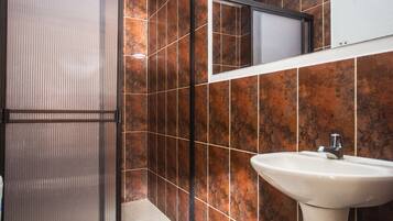 Shower, towels, soap, toilet paper