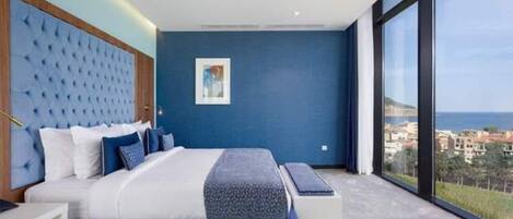 Biancheria da letto di alta qualità, minibar, postazione laptop