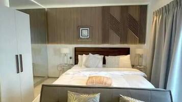 1 habitación, escritorio, tabla de planchar con plancha y wifi gratis