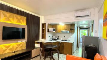 50-inch flat-screen TV with digital channels, Netflix