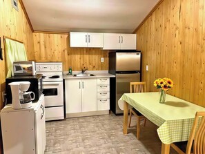 Fridge, stovetop, cookware/dishes/utensils - 2-Bedroom Cottage #9 - Ambleside (Kawartha Lakes)