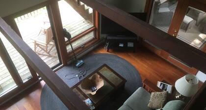 Privacy surrounds this home with a mountain view and lake access.