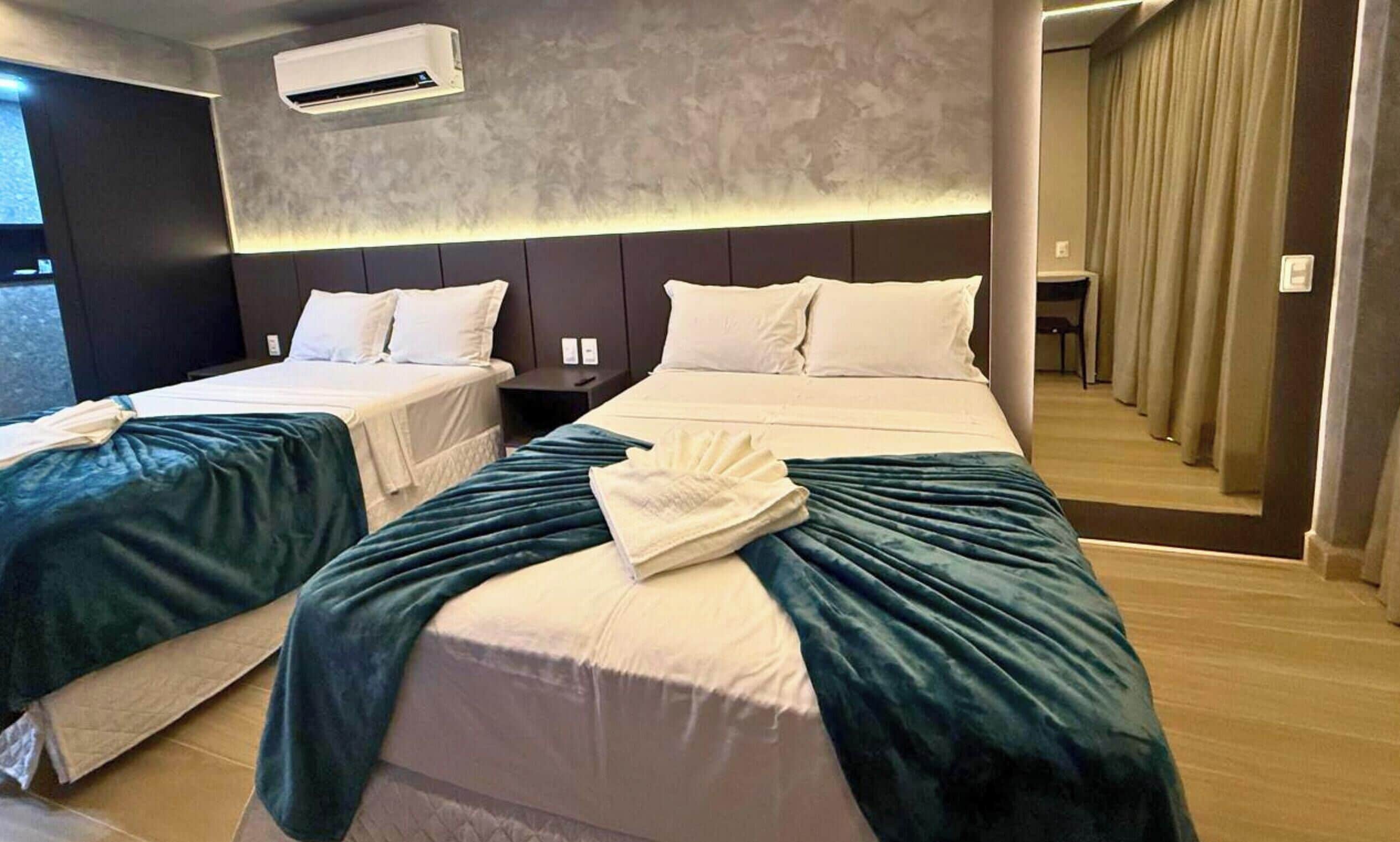 Deluxe Quadruple Room | Pillowtop beds, desk, laptop workspace, free WiFi