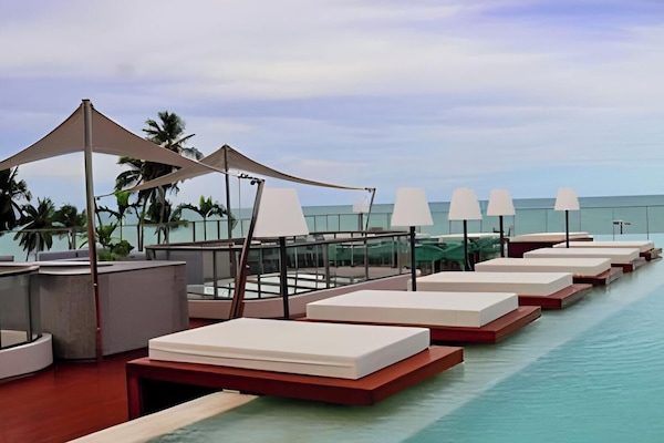 2 outdoor pools, open 8:00 AM to 10:00 PM, sun loungers