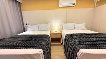 Deluxe Quadruple Room | Pillowtop beds, desk, laptop workspace, WiFi (free)