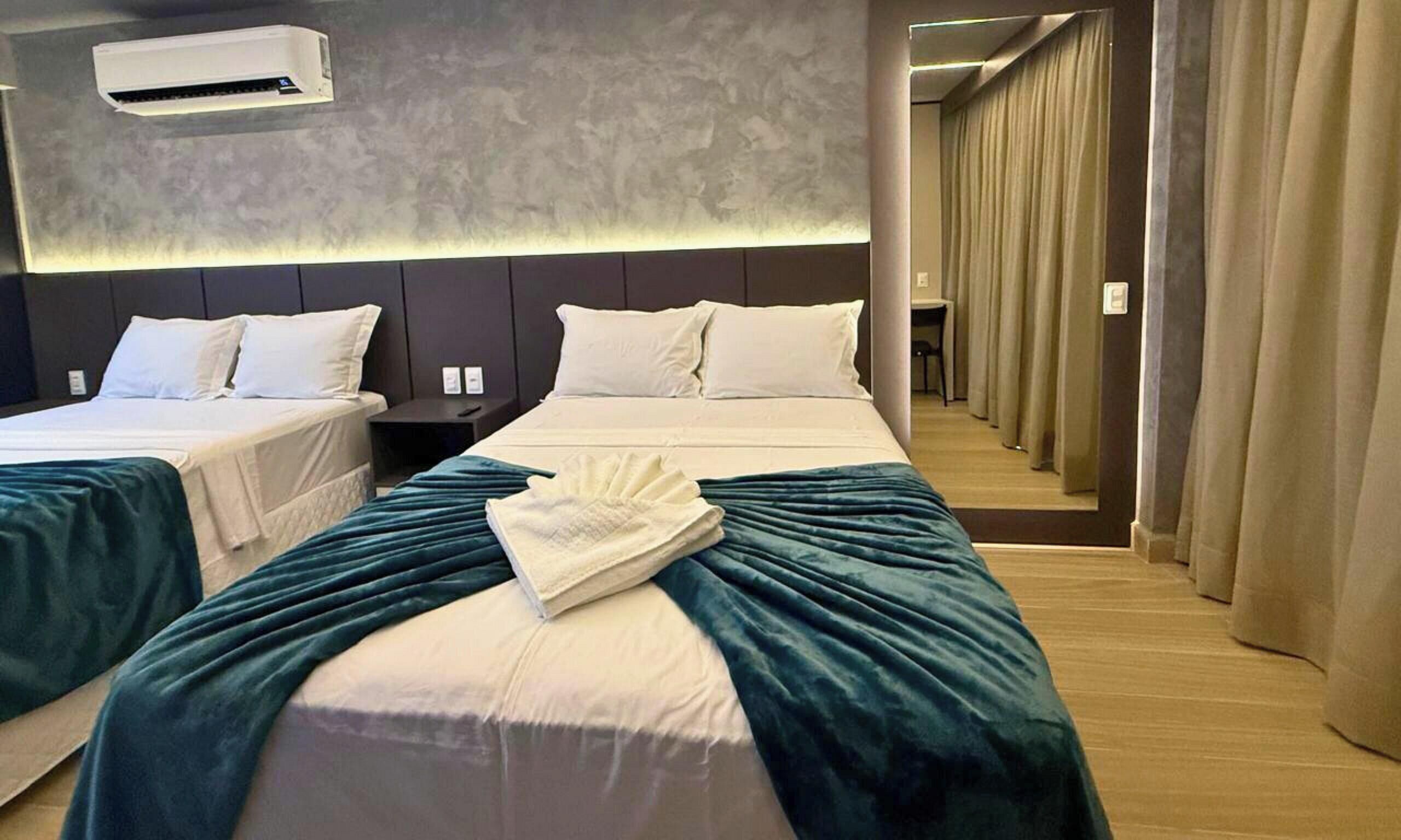 Deluxe Quadruple Room | Pillowtop beds, desk, laptop workspace, free WiFi