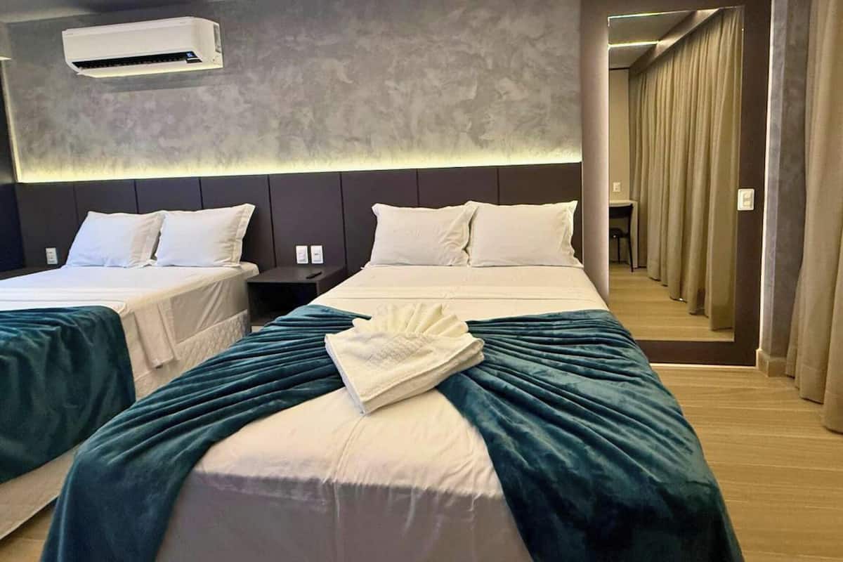 Deluxe Quadruple Room | Pillowtop beds, desk, laptop workspace, free WiFi