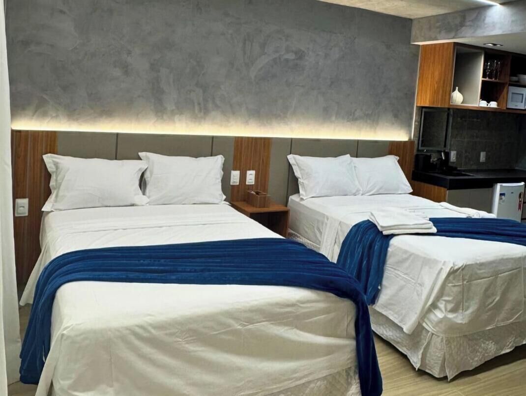 Deluxe Quadruple Room | Pillowtop beds, desk, laptop workspace, free WiFi
