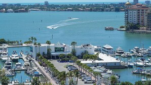 A marina with boats docked, a building with a dome, and a clear view of the water. - Charming 3-bedroom house with private pool  and in delightful Sarasota...  (Sarasota)