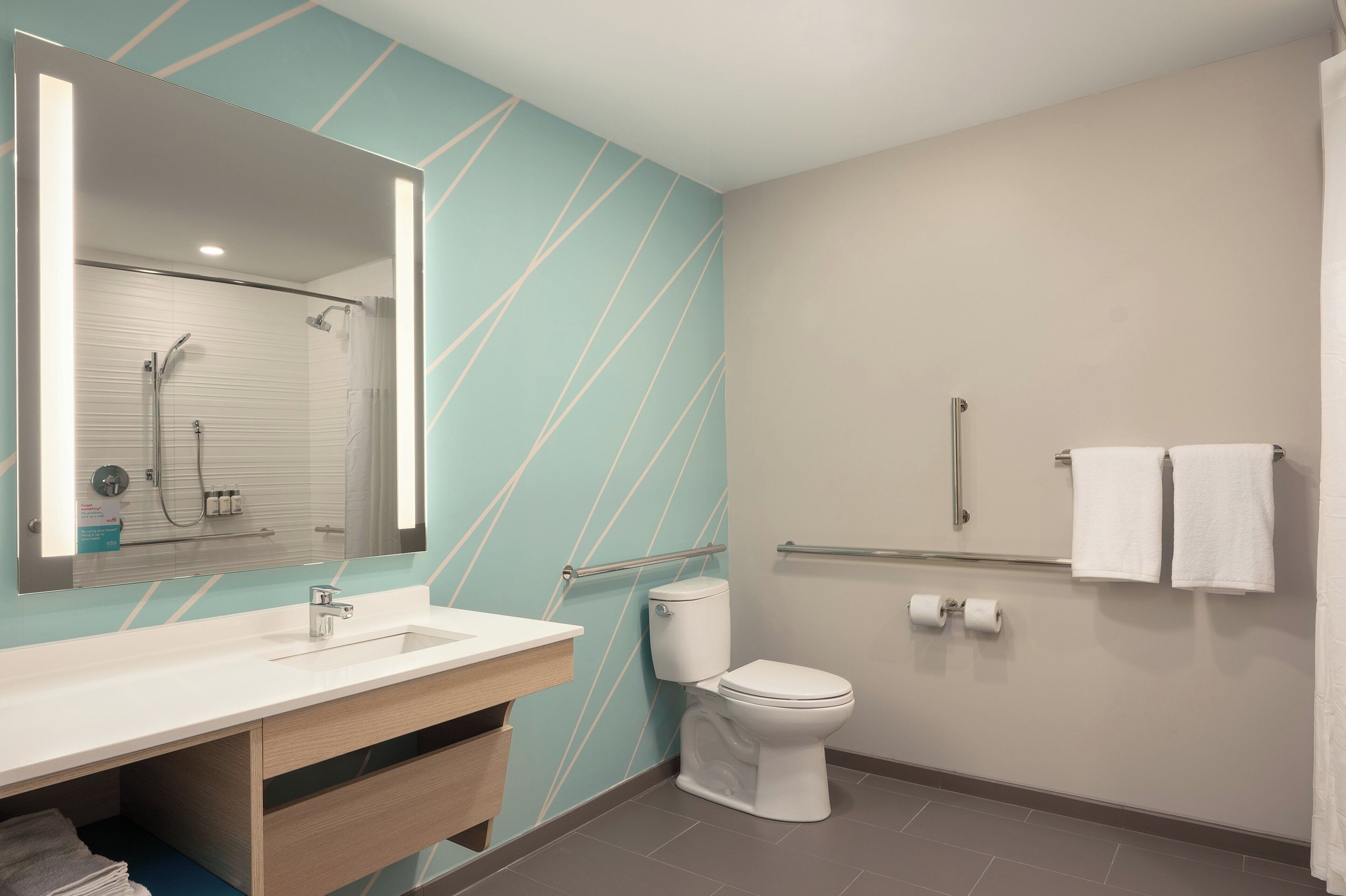 Shower, eco-friendly toiletries, hair dryer, towels