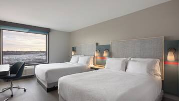 Colchones con pillow-top, escritorio y espacio para trabajar con laptop