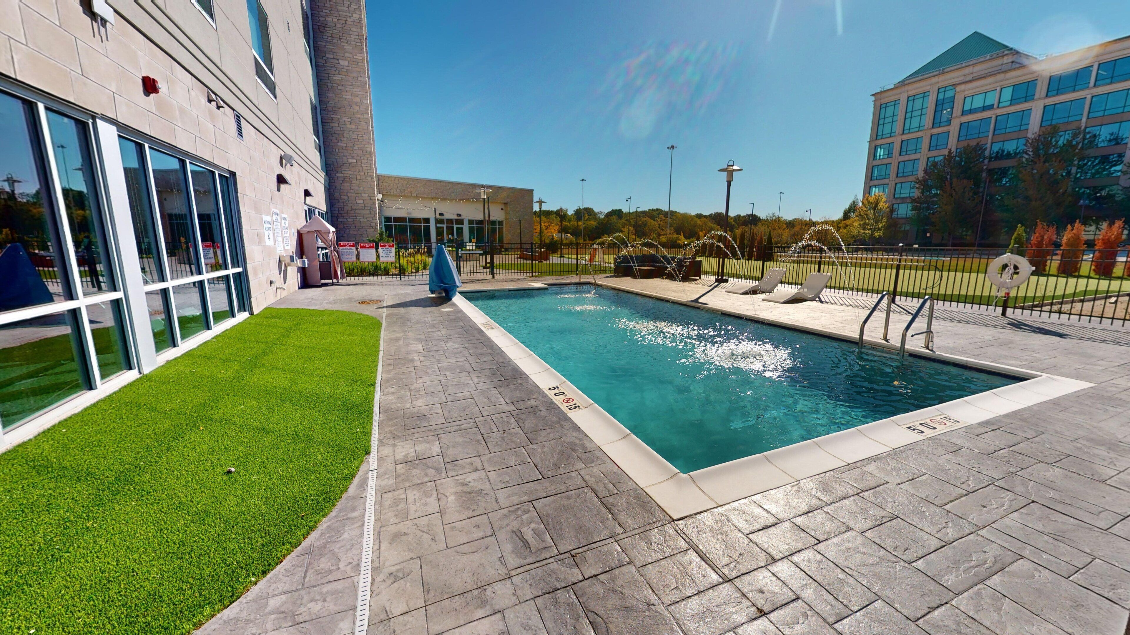 Outdoor pool, free pool cabanas, pool umbrellas