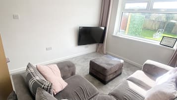 House | Living area | TV, fireplace