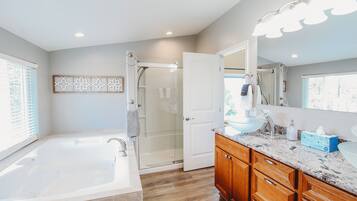 Jetted bath, hair dryer, towels, soap