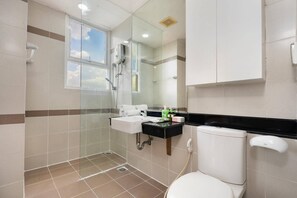 Shower, hair dryer, towels, soap