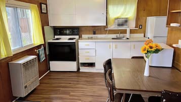 Fridge, stovetop, cookware/dishes/utensils