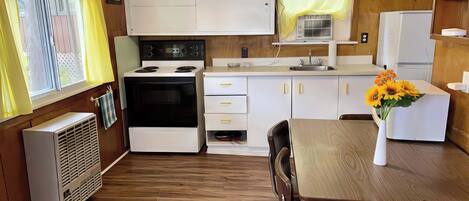 Fridge, stovetop, cookware/dishes/utensils