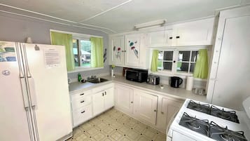 Fridge, stovetop, cookware/dishes/utensils