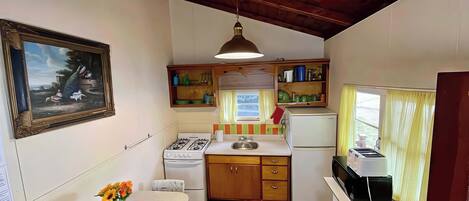 Fridge, stovetop, cookware/dishes/utensils