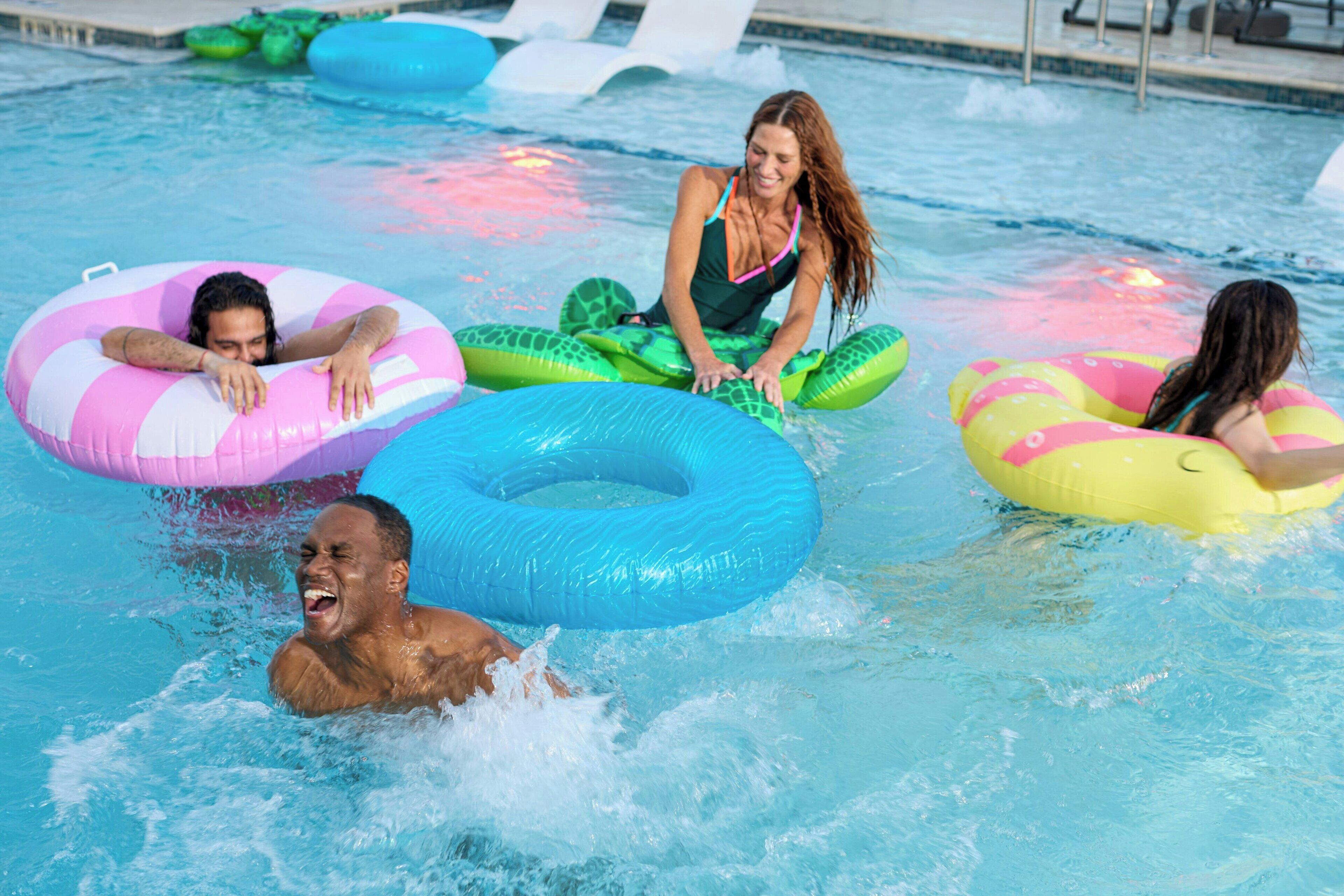 A swimming pool with inflatable rings.