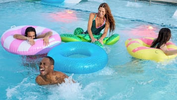 A swimming pool with inflatable rings.