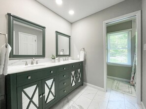 Master Ensuite with attached shower/toilet room.