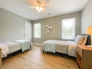 Bedroom 4 with two twin beds. No access to closet in this room (used for supplies for the home).