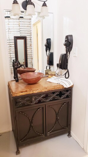 Hair dryer, towels, soap, shampoo