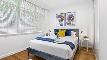 1 bedroom, desk, iron/ironing board, travel cot