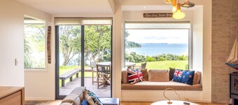 Newly renovated waterfront home with good indoor living and leading to the beach