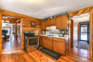Coffee/tea maker, high chair, cookware/dishes/utensils, dining tables - Cozy Mount Union Cabin w/ Fire Pit & River Access (Mt Union)