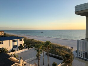 On the beach, sun loungers, beach towels